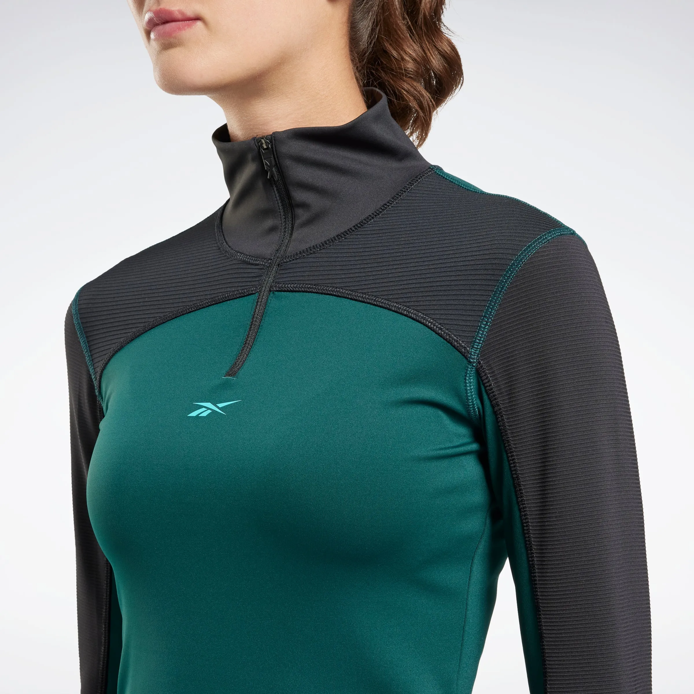 Reebok Apparel Women Tech Style Thermowarm Graphene Quarter-Zip Sweatshirt Forgrn
