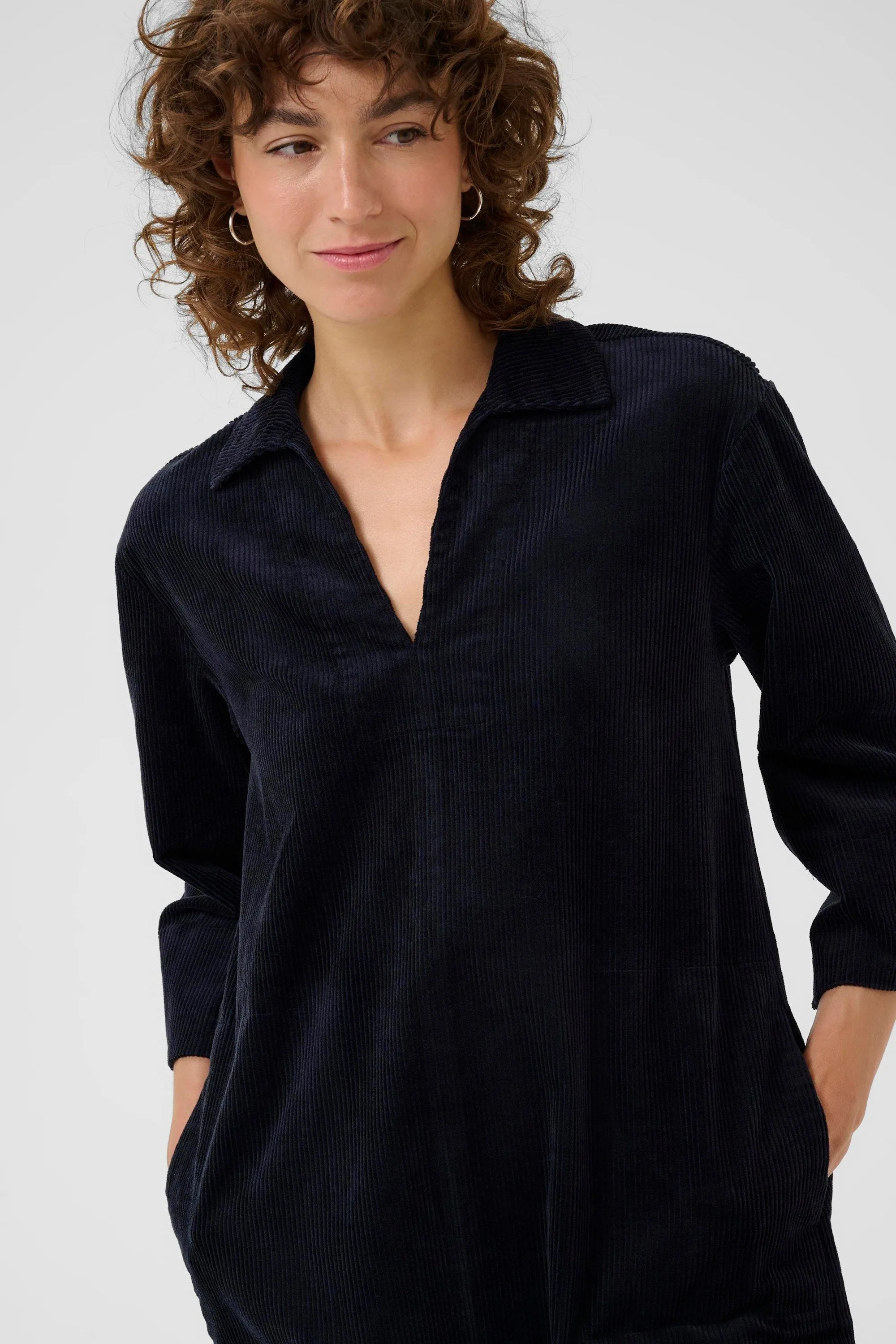 SHARRI CORD DRESS Form Fit Subtle Charm