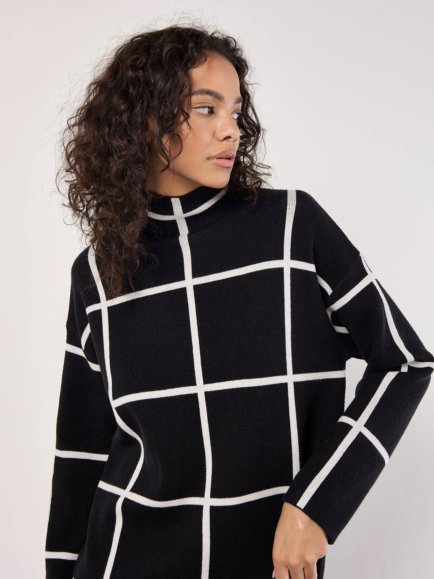 Seasonal piece Spring Style Windowpane Sweater Dress in Black